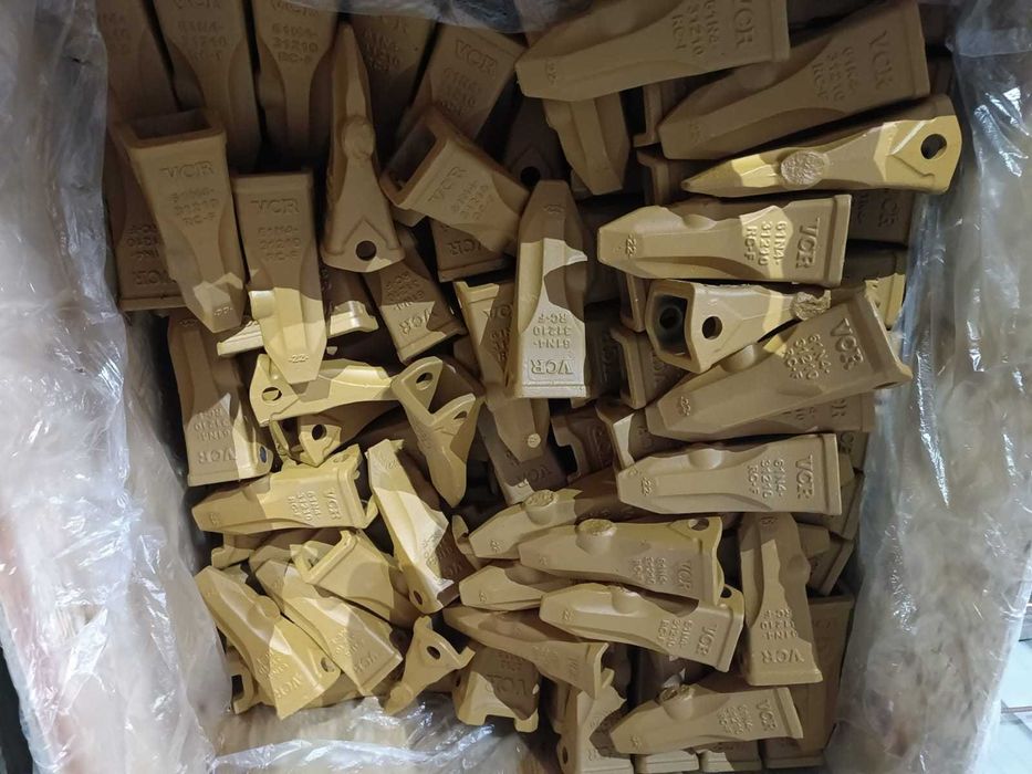 Коронки зубья на экскаваторы