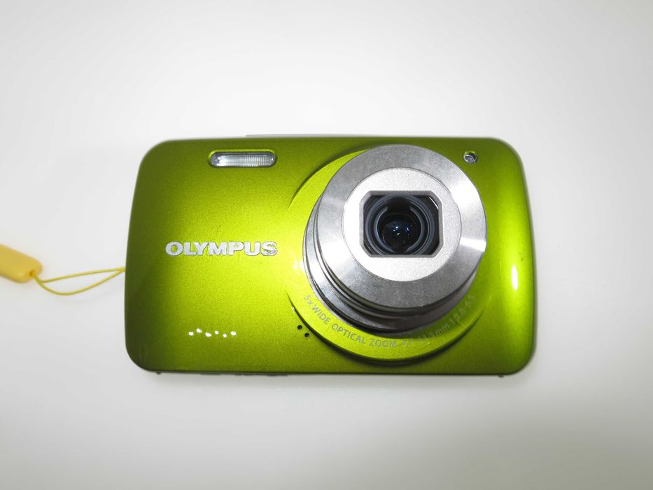 Olympus VH 210 ултра компактен фотоапарат в страхотен свеж зелен цвят и състояние като НОВО, тестван и работи отлично, пълен комплект