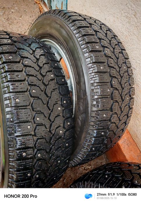 Продам диски с резиной на шипах на Субару