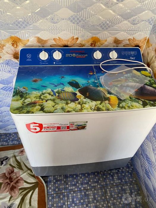 Kir yuvish mashinasi yangi ishlatilmagan9 kg lik 5 yillik kafolati bor
