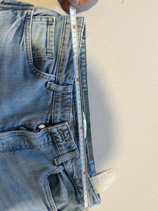 Blugi Zara 40 42 barbatesti deschisi albastri cu rupturi cam 40 marime