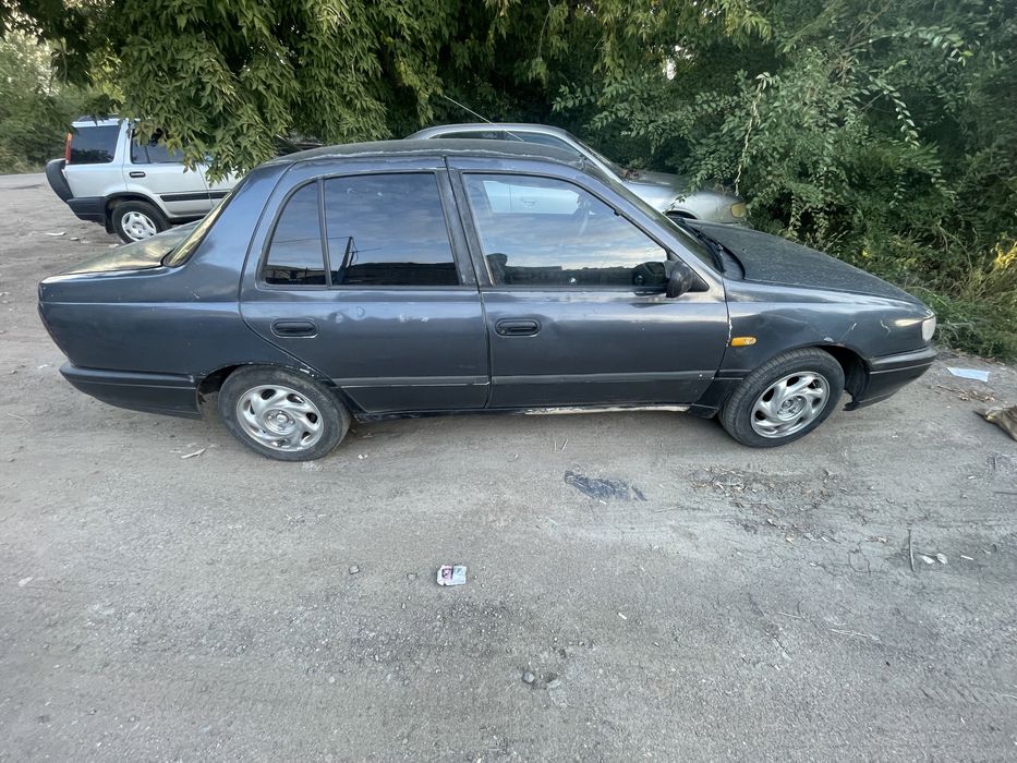 Продам Ниссан Сани 1992 года