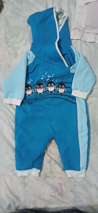 Продам тёплые комбинезон для новорождённого