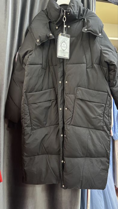 Куртки новые