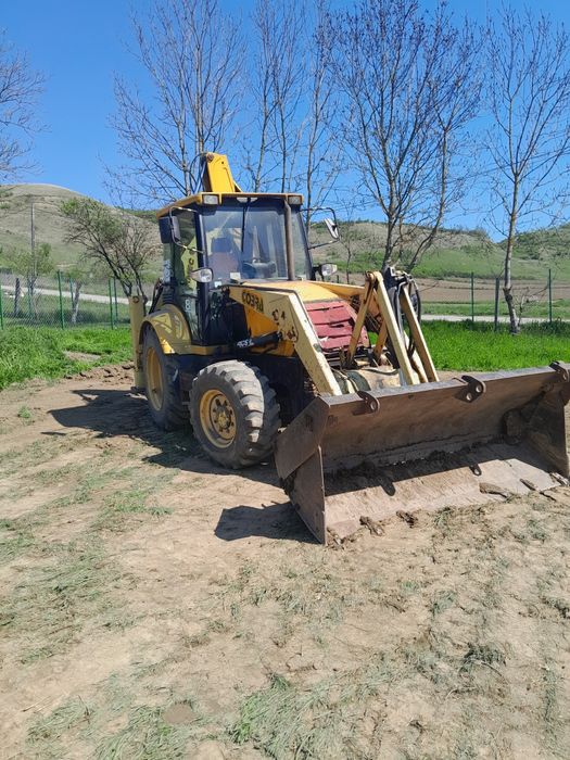 Dezmembrez buldoexcavator terex fermec mf 860
