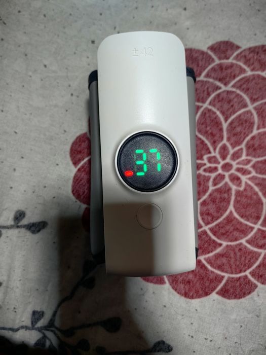 Електрическа помпа за кърма NUK и преносим нагревател за топлене мляко