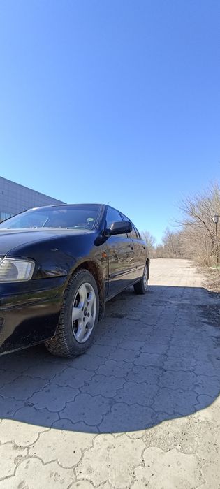 Ниссан Примера Р11