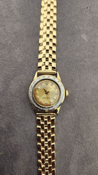 Золотые женские часы Rolex