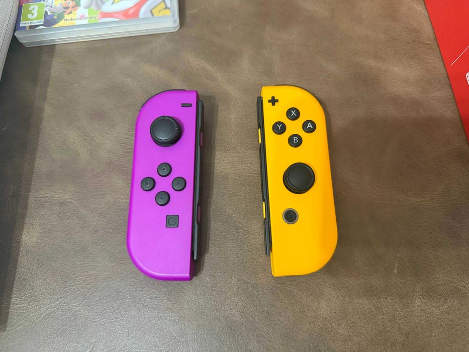 Nintendo Switch OLED White + 512GB + 12 игри + Допълнителни Joy-Con