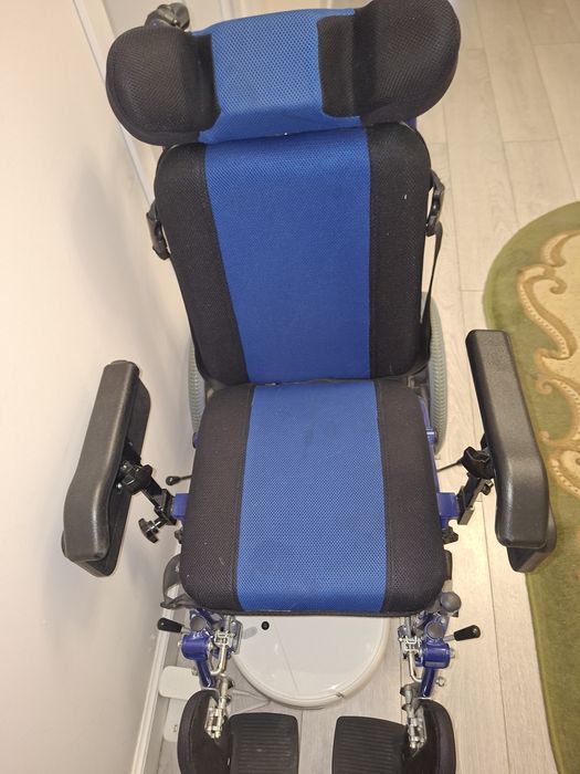 Инвалидное кресло и биотуалет