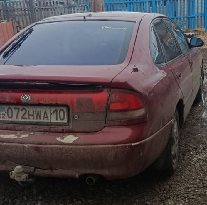 Мазда Кронос по запчастям.