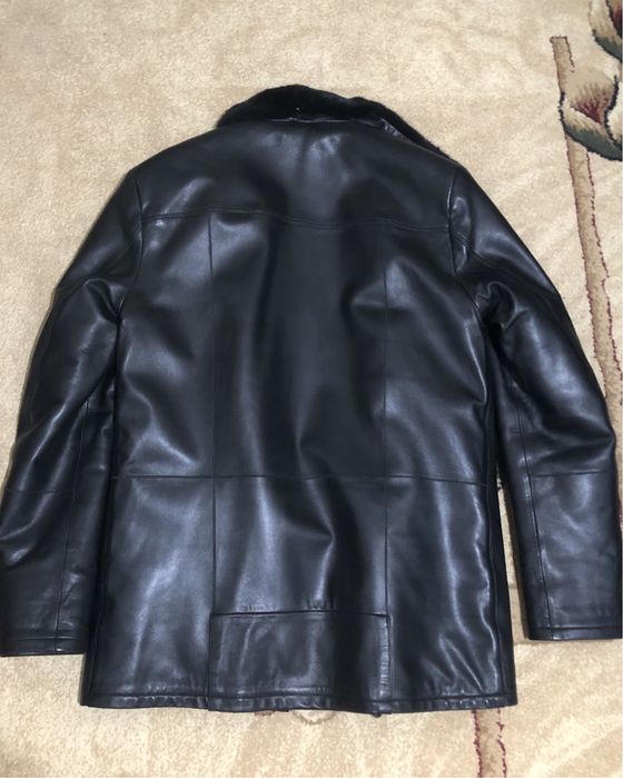 Кожаная куртка .