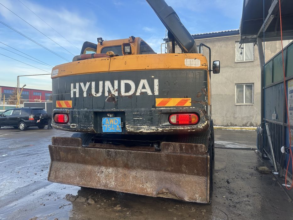 Экскаватор колеснный 140