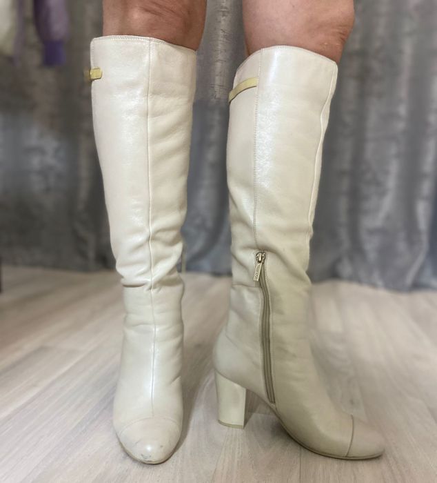 Женские сапоги..