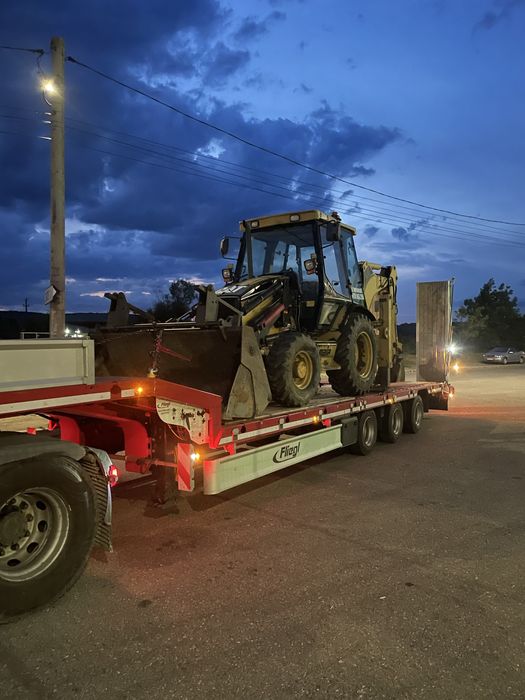 Transport utilaje, marfa, agregate,inchiriere trailer