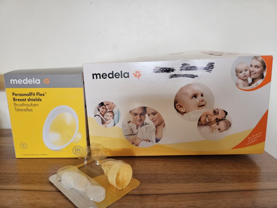 Ръчна помпа Medela Harmony + резервни части