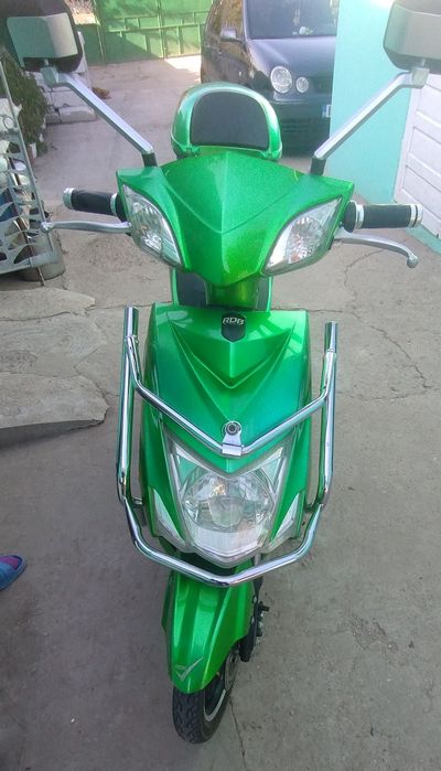 Scuter electric pe curent