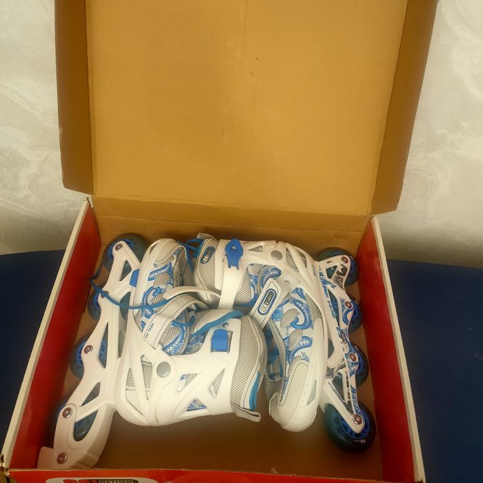 Роликовые коньки