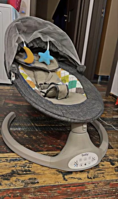 Leagăn electric pentru bebeluși