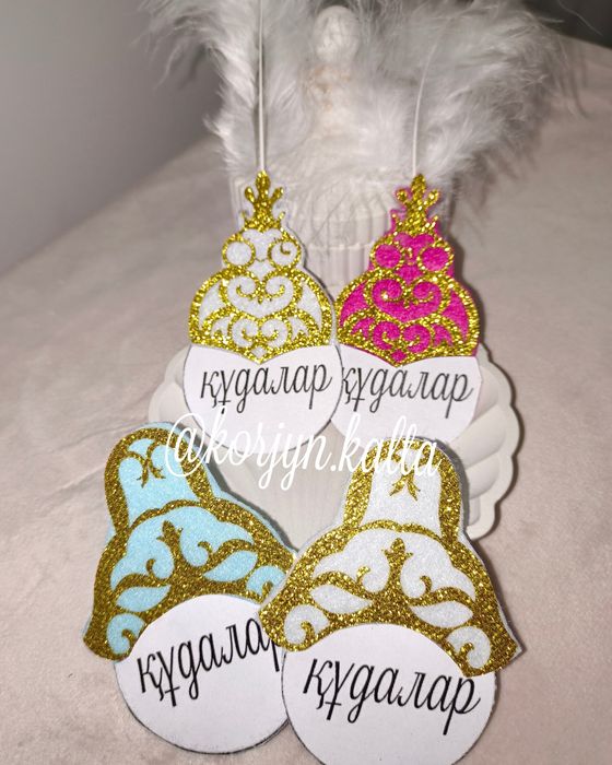 Значки құдалар төсбелгі