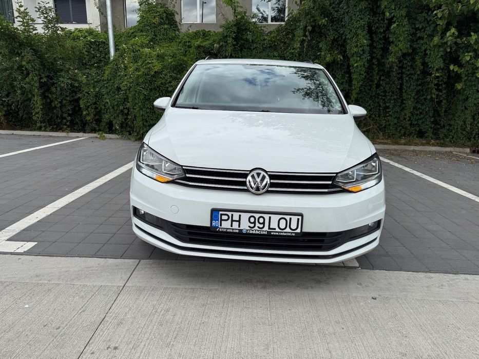 Volkswagen Touran Prim propietar cu verificare la reprezentanta km reali masina de Direc