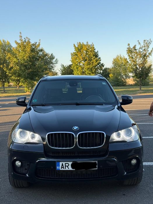 BMW X5 2011 — imagine 1