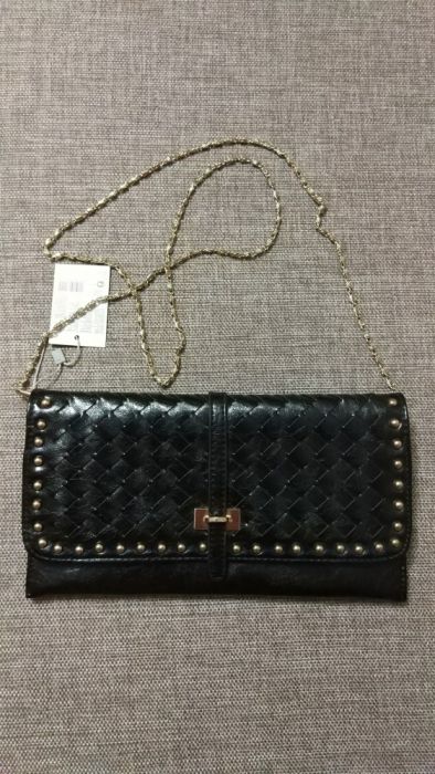 Клатч от известной сети магазинов "Кари" Москва. Новый. 26х13,5 см.