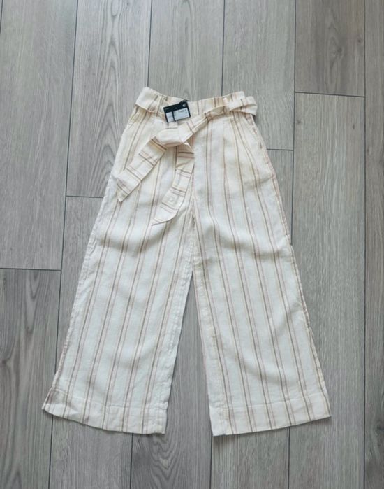 pantaloni  110(4/5 ani) noi