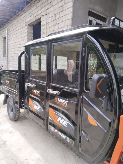 Elektr trikikl sotiladi, yopiq kabinli, juda qulay va iqtisodiy.