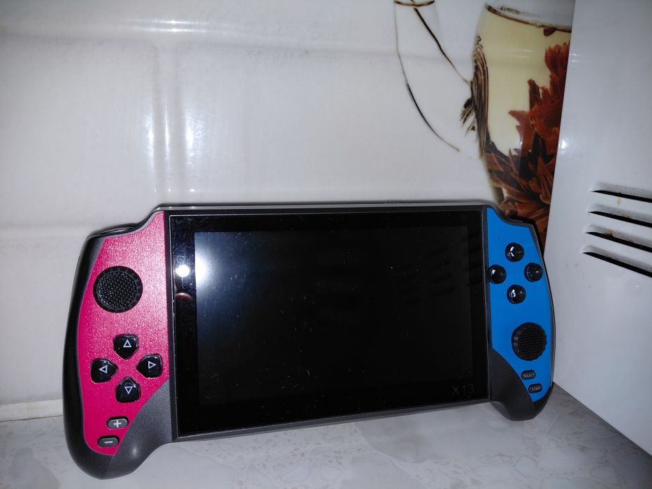 Игровая приставка х13