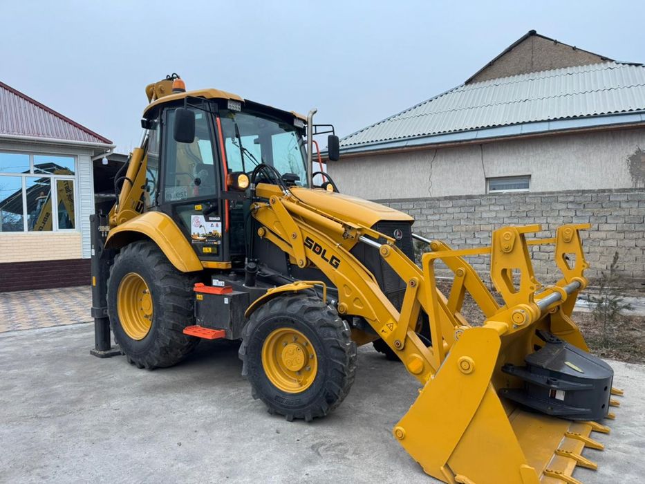 Эксковатор погрузчик 3в1