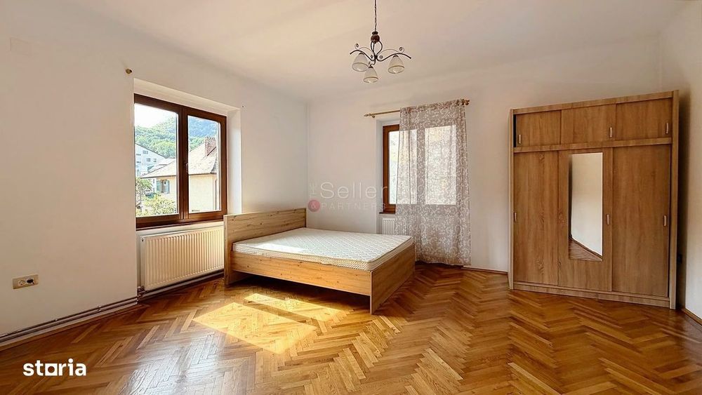 Apartament cu Acces la Curte Garaj Inclus