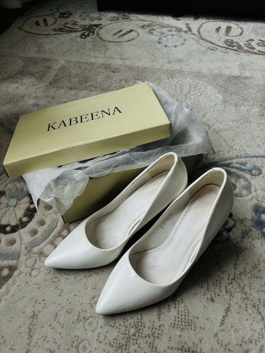 Женский белый каблук