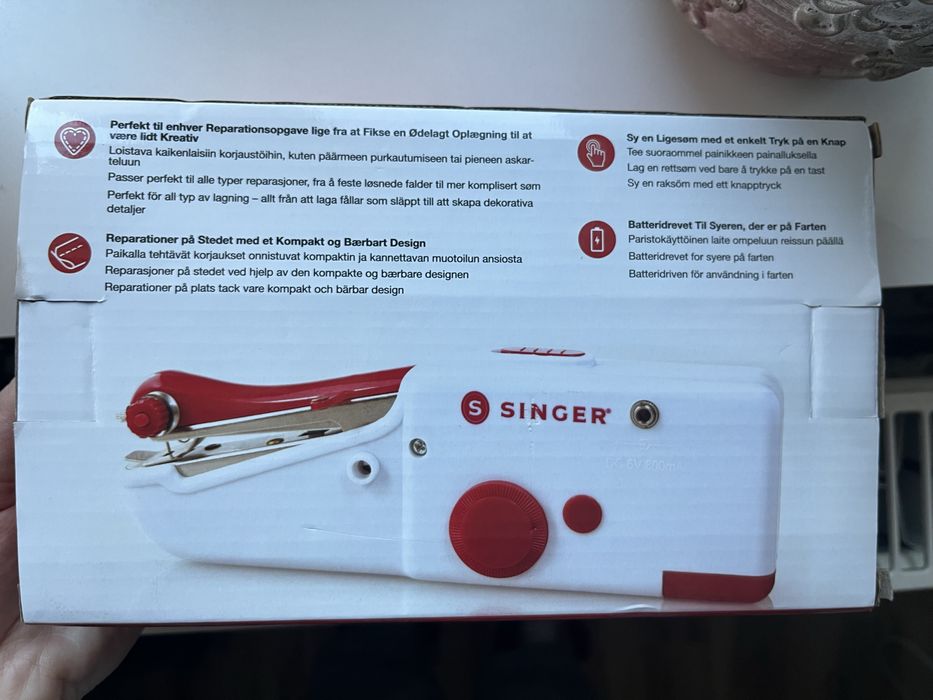 Masina de cusut de mana Singer