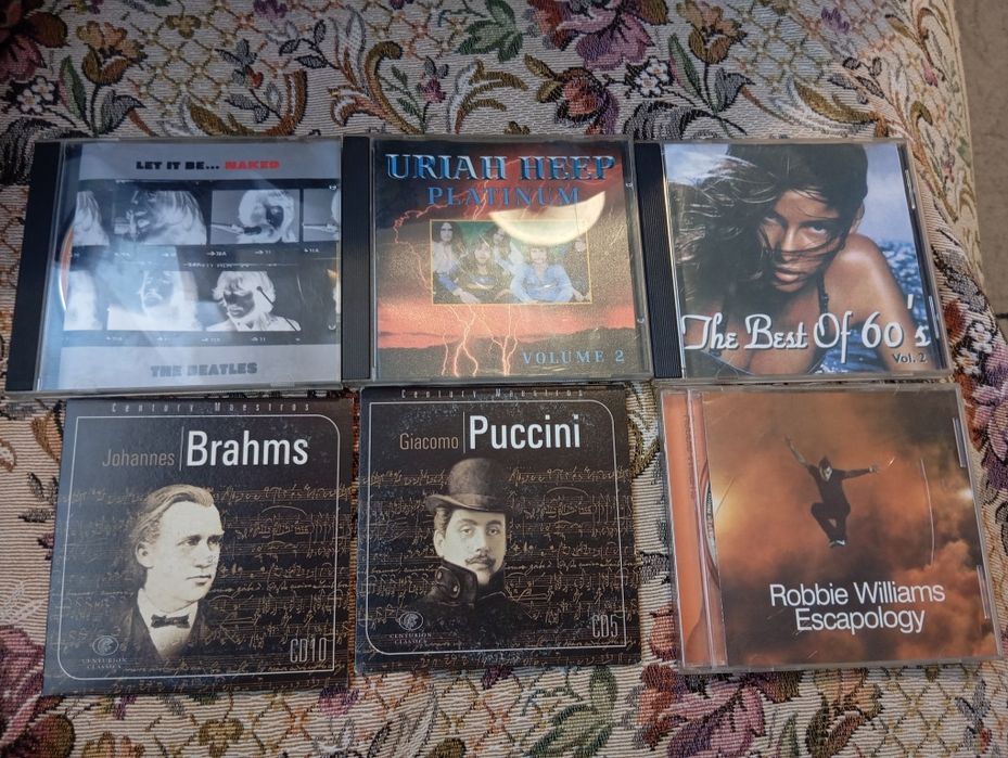 Cd дискове с рок музика и класика