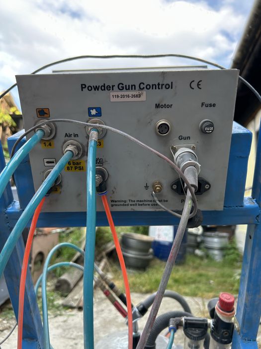 Pistol de vopsit in camp electrostatic