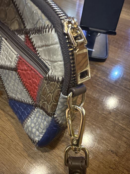 Женский клатч сотилади