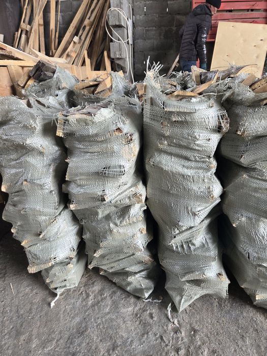 Дрова рубленные в мешках