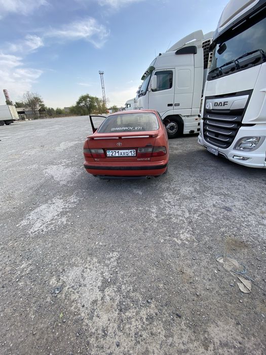 Тойота карина е