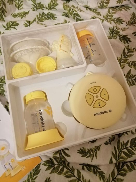 Молокоотсос Medela swing flex