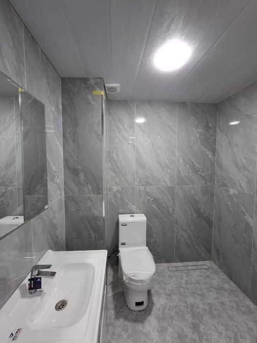 Продам квартиру новостройка на 1 ом этаже 55 кв 2 х комнатная