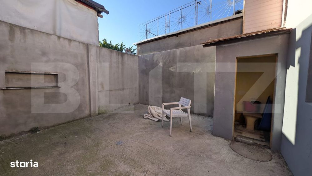 Casa cu 2 camere si mansarda ,plus bucatarie de vara .