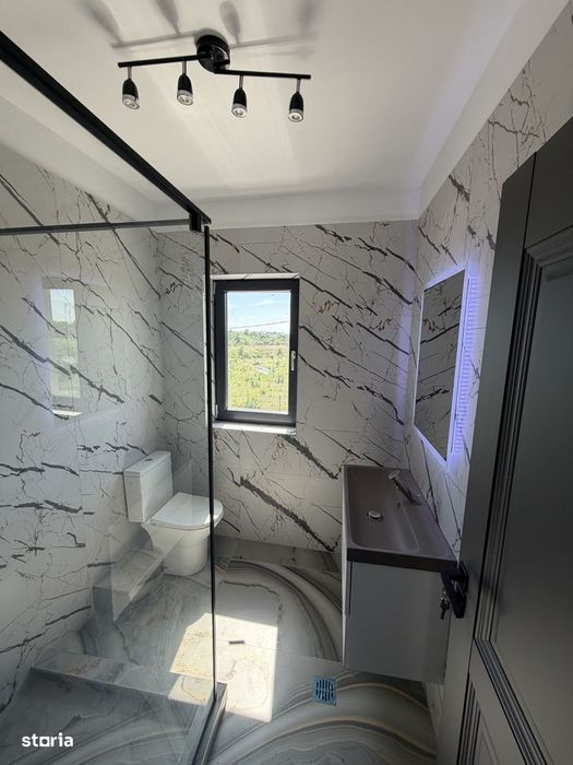 Casa nouă cu 4 camere și curte privată