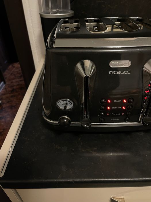 Тостер Delonghi с четири гнезда