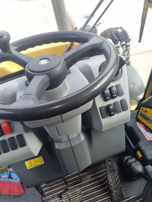 De vinzare sau inchiriat Buldoexcavator