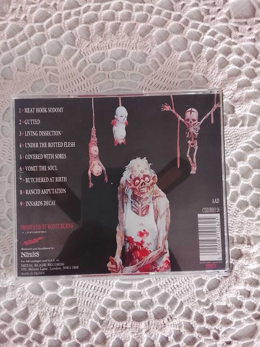 Cannibal Corpse-Butchered at Birth и Tomb of Mutilated