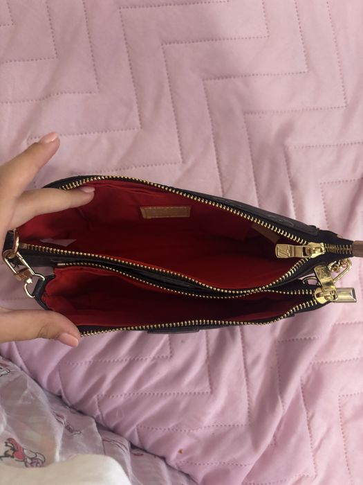 Genti Louis Vuitton