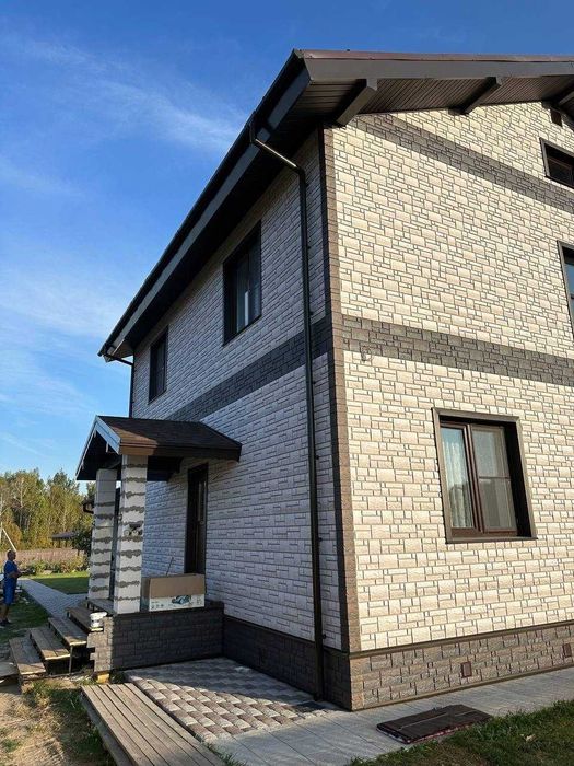 Сайдинг, водосток,фасадные панели Docke