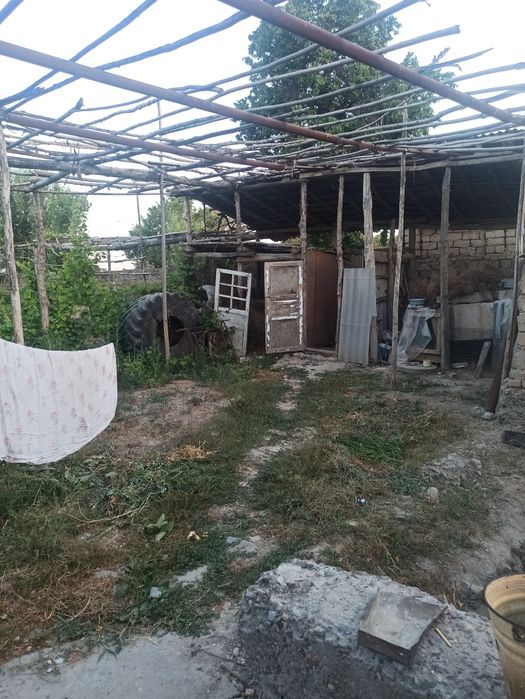 Uy 5 xona 2 ta korpus umumiy 10 xona 10 sotik tomorqa maydon