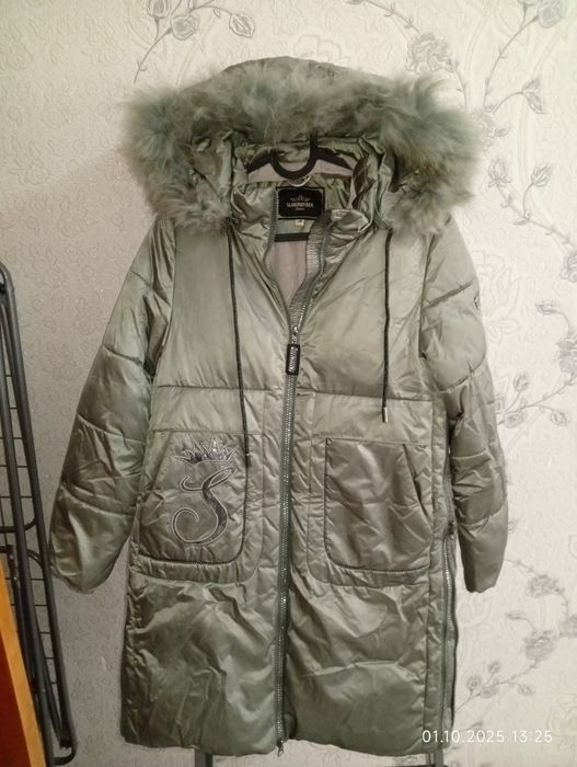 Продам зимний пуховик.